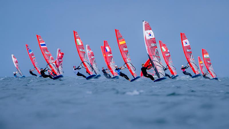 The men's field of the iQFOiL Games at Kieler Woche on a course race with Fabian Wolf from Kiel in the blue jersey - photo © Sascha Klahn / Kieler Woche