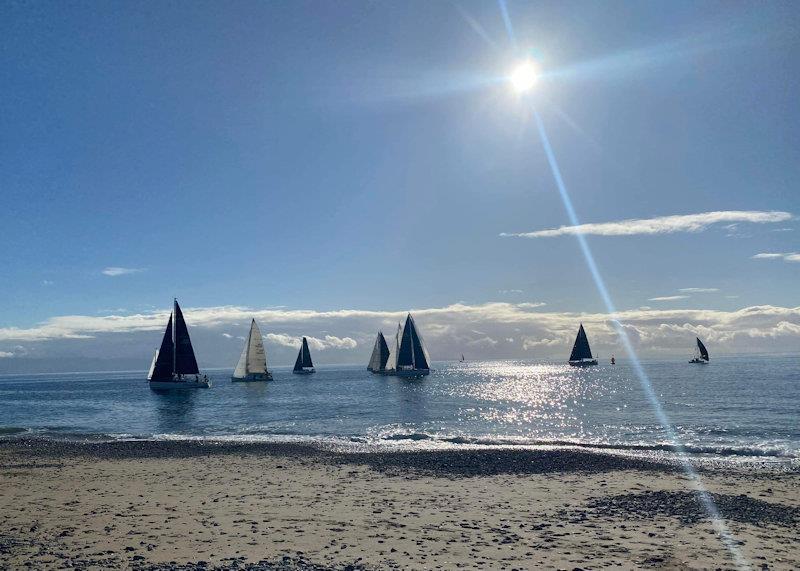 Racing enjoyed by spectators on Pwllheli South Beach - Pwllheli Autumn Challenge Series week 3 photo copyright Angela Jenkinson taken at Pwllheli Sailing Club and featuring the IRC class