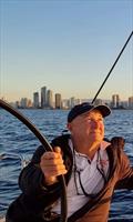 Southport Yacht Club Commodore, Glenn Burrell at the helm © Southport Yacht Club