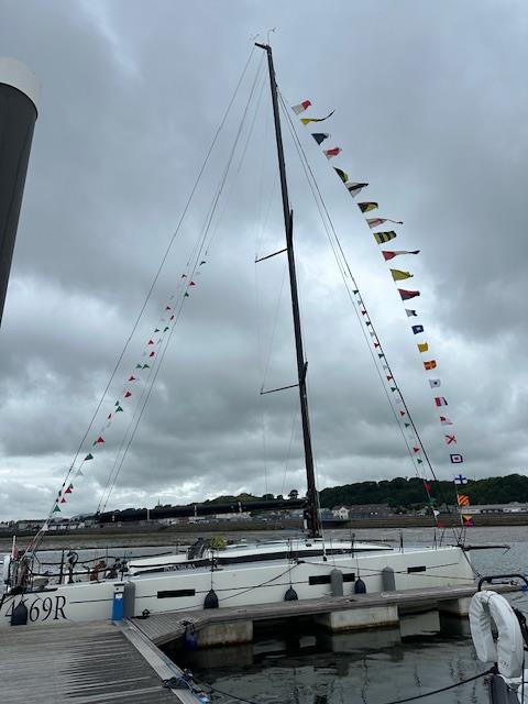 Pwllheli Regatta flags flying in Plas Heli marina on Pata Negra, just returned from a tough Round Ireland Yacht Race photo copyright Victoria Cox taken at Pwllheli Sailing Club and featuring the IRC class