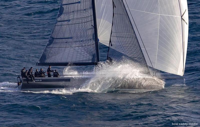 Caro flying through the Heads ploughing through the waves - Bird Island Race  - photo © CYCA | Bow Caddy Media