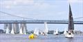 The sailing fleet competes with the Ben Franklin Bridge in the background during the 2024 Philadelphia Cup Regatta © Nicole Feller-Johnson