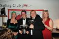 Peter Dunlop and Ian ‘Sammo' Jones collecting Mojito's trophies from Vice Commodore Victoria Cox and Commodore Lyndsay Harrold - Pwllheli SC Christmas Prize-giving &copy; Gerallt Williams