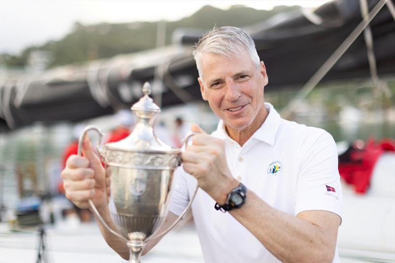 Bryon Ehrhart lifts the IMA Transatlantic Race Trophy for Monohull Line Honours - photo © Arthur Daniel / RORC