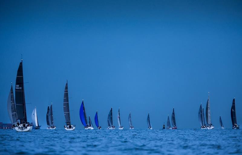 RORC Fleet at twylight - 2025 RORC Cowes Offshore Racing Series  - photo © Paul Wyeth / RORC