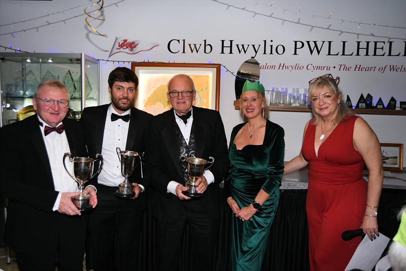 Stephen Tudor, SamandAndrew Hall receiving Jackknife and Pata Negra trophies from Vice Commodore Victoria Cox and Commodore Lyndsay Harrold - Pwllheli SC Christmas Prize-giving photo copyright Gerallt Williams taken at Pwllheli Sailing Club and featuring the IRC class