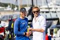 Sam Hall receives the IRC Two winners' prize from RORC Transatlantic Race Director Chris Jackson &copy; Arthur Daniel / RORC