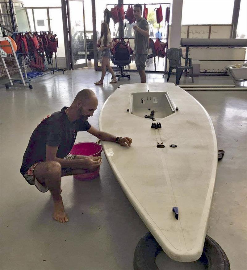 Repairs before commencing the World Record attempt of over 300nm - in a Laser! photo copyright Yassine Drk taken at  and featuring the ILCA 7 class
