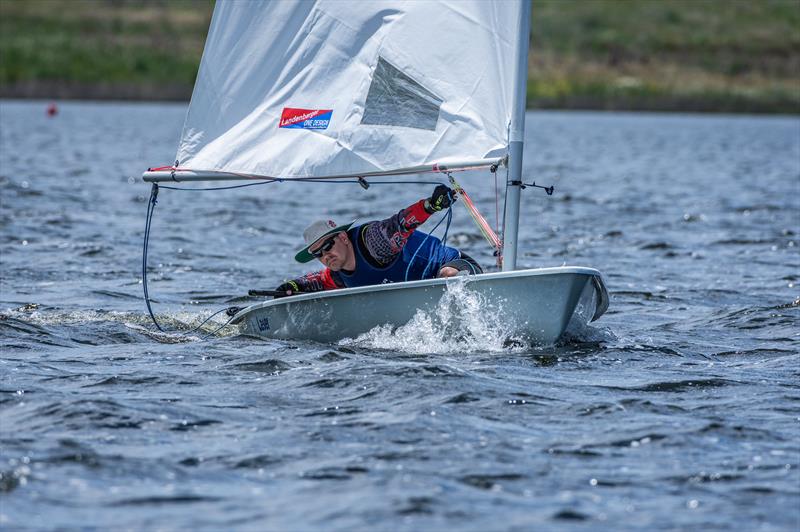 Former NESC commodore Andy Sawyer, light air flyer, snaps a gybe at the last Thunderbolt Regatta photo copyright Paulo Lagos taken at New England Sailing Club and featuring the ILCA 7 class