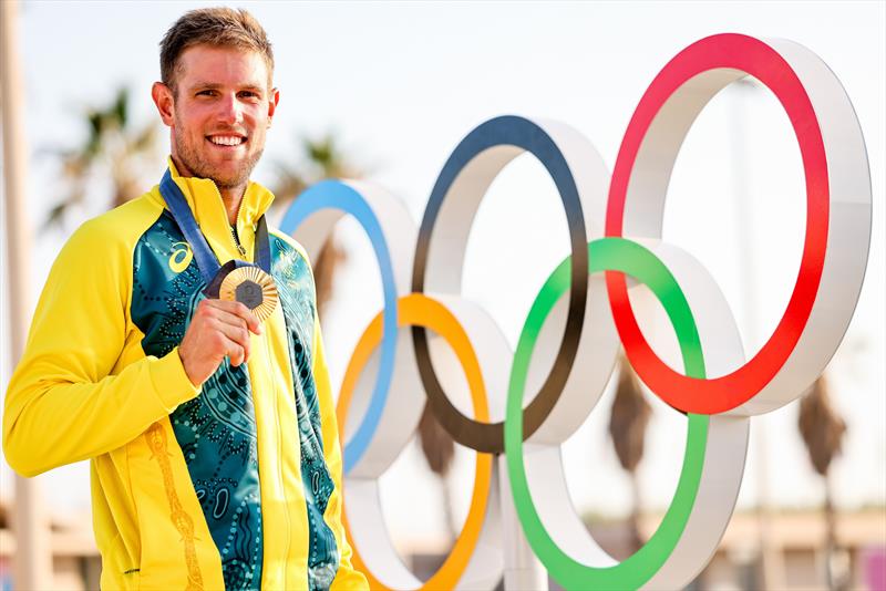 Matt Wearn with his Olympic gold at Paris 2024 - photo © Sailing Energy