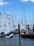 An on-water traffic jam on Saturday during Kieler Woche when five fleets are released to launch at once © Martin Pascoe