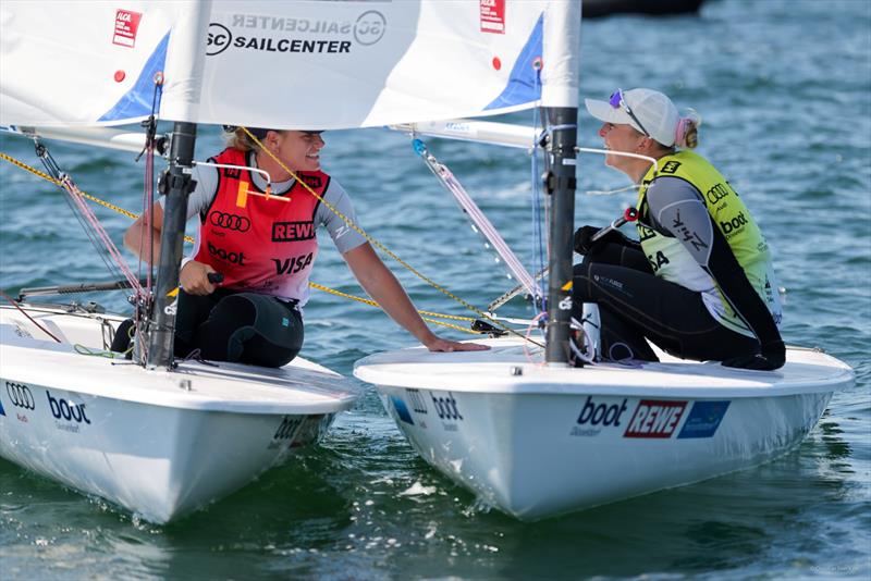 Still goods friends finishing Kiel Weeks medal Race are overall winner Agata Barwinska (right) and Dane Anna Much photo copyright Christian Beeck taken at Kieler Yacht Club and featuring the ILCA 6 class