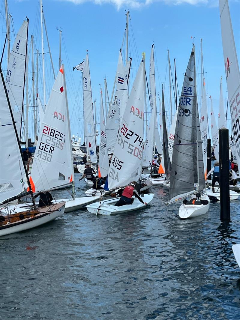 An on-water traffic jam on Saturday during Kieler Woche when five fleets are released to launch at once photo copyright Martin Pascoe taken at Kieler Yacht Club and featuring the ILCA 6 class