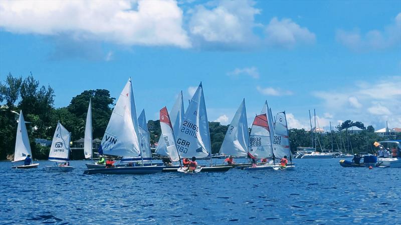 Waiting for the start of the first race during the CG United Insurance SVG Youth National Sailing Championships 2024 photo copyright Jenny Trumble taken at  and featuring the ILCA 6 class