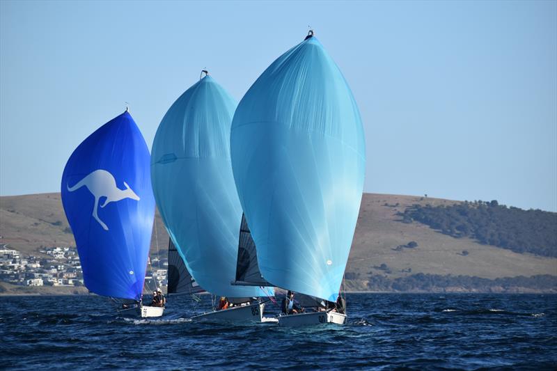 The Hutchins School (left) and Mind Games (right) on the River Derwent - photo © Jane Austin