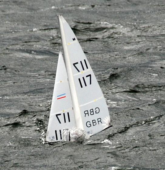 On the run the hull of Roger's UP completely disappeared into a big wave during MYA Marblehead Ranking 3 & 4 at Datchet Water  photo copyright Keith Parrott taken at Datchet Water Radio Sailing Club and featuring the Marblehead class