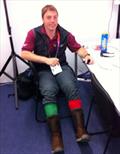 Tom Gruitt in his Ben Ainslie socks after a long day on the water at the 2012 Olympic Games © Gael Pawson