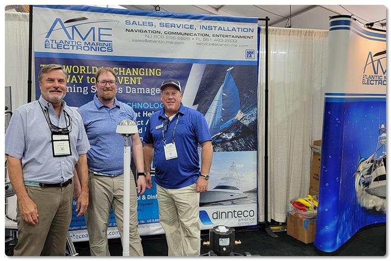 Vice President of ComMar Ken Smaga (left) and AME Operations Manager Bill Cunane (right) are pictured with Todd at AME's Palm Beach Show display that features the Dinnteco product. - photo © Viking Yachts