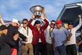 Riptide Racing's Chris Poole hold the Congressional Cup aloft &copy; Ian Roman