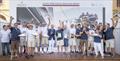 Hap Fauth, Terry Hutchinson and the winner Bella Mente crew at tonight's prizegiving in Sorrento - IMA Maxi European Championship 2025 © IMA / Studio Borlenghi 