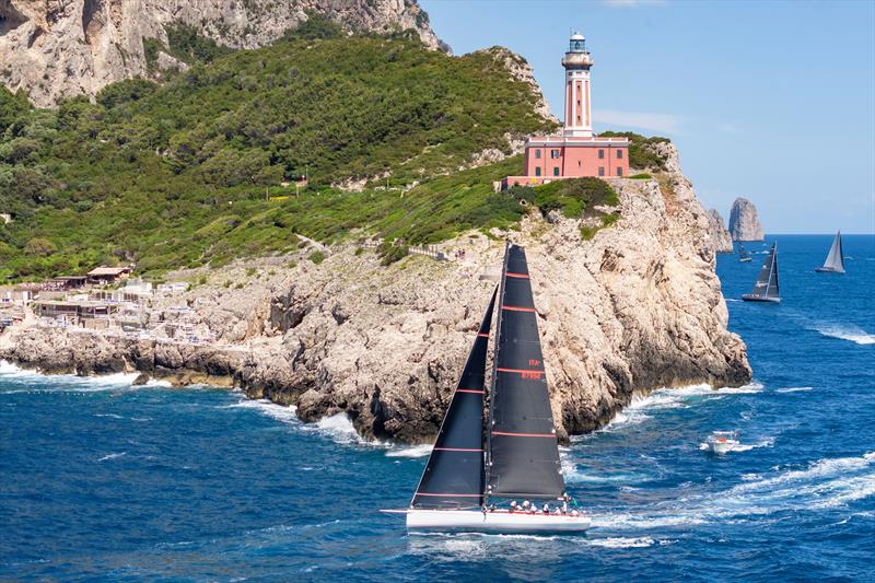 Guido Paolo Gamucci's canting keel Mylius 60 Cippa Lippa X passes Capri's imposing lighthouse at Punta Carena on day 3 of the IMA Maxi Europeans photo copyright IMA / Studio Borlenghi  taken at Circolo del Remo e della Vela Italia and featuring the Maxi class