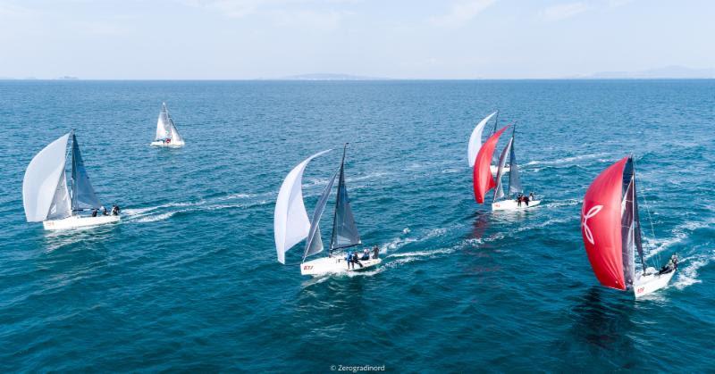 Melges 24 fleet in downwind course in Punta Ala - 2018 Melges 24 European Sailing Series - Final day - photo © Zerogradinord / IM24CA