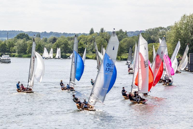 The fleet head upstream against the stong flow - Merlin Rocket River Championships photo copyright Tony Ketley taken at Upper Thames Sailing Club and featuring the Merlin Rocket class