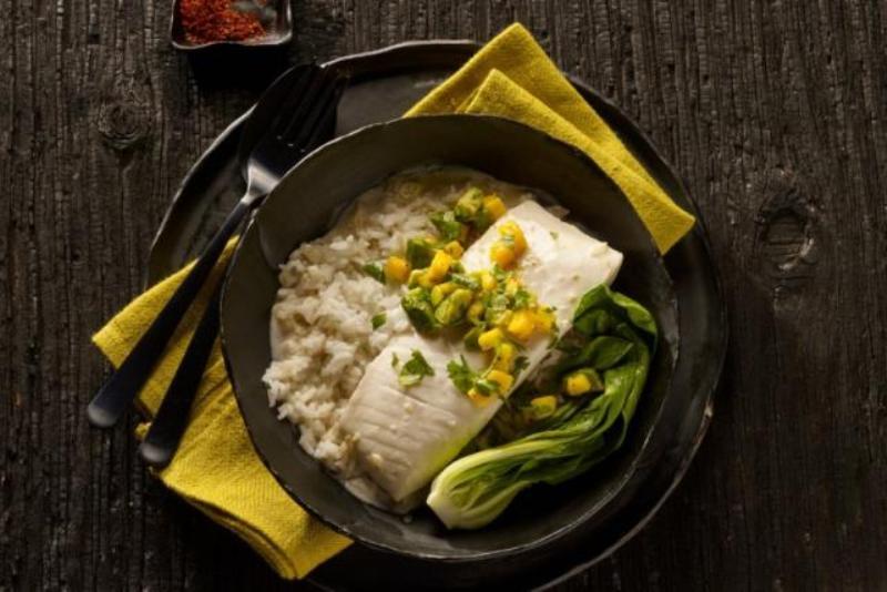 Coconut-poached halibut with mango salsa is a flavorful way to celebrate your successful day on the water. - photo © Alaska Seafood