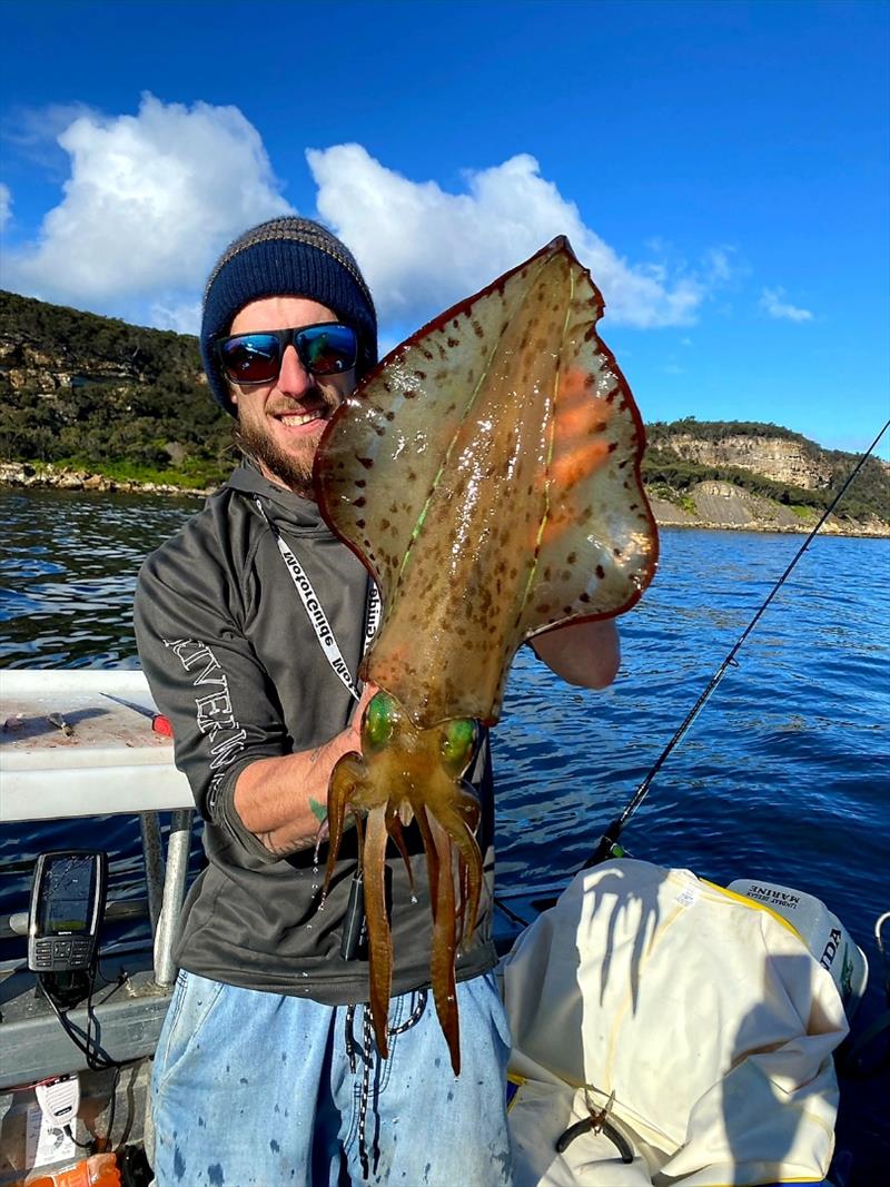 Jason Hales with a ripper calamari from the East Coast photo copyright Carl Hyland taken at 