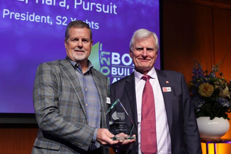 Tom Slikkers, president and CEO of Tiara Yachts, accepted the Boat Builder Awards Lifetime Achievement award from IBI's publishing director Nick Hopkinson on behalf of his father Leon photo copyright Pieter Magielsen taken at 