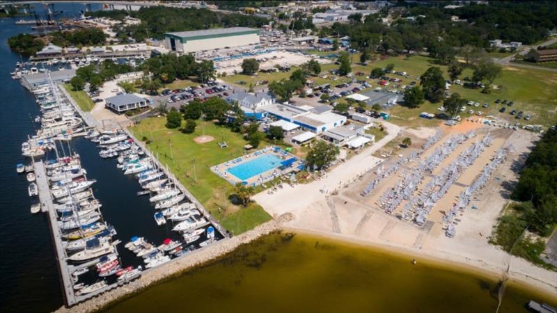 Pensacola Yacht Club sits on 22 acres where Bayou Chico flows into Pensacola Bay. Small boats ike these 301 Optis, launch from the 250 foot beach. Plenty of trailer space is available for boat storage between regattas photo copyright Barnes & Co / Pensacola YC taken at Pensacola Yacht Club