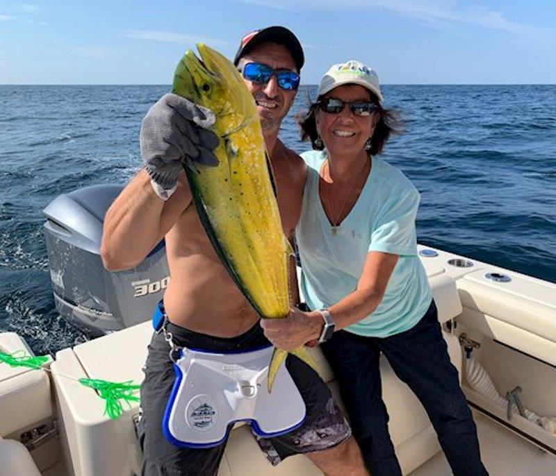 Looks like dinner is in the boat as Ernie Jr. and his mother, Maryanne, show off a great catch on the Freedom 235 photo copyright Grady-White taken at 