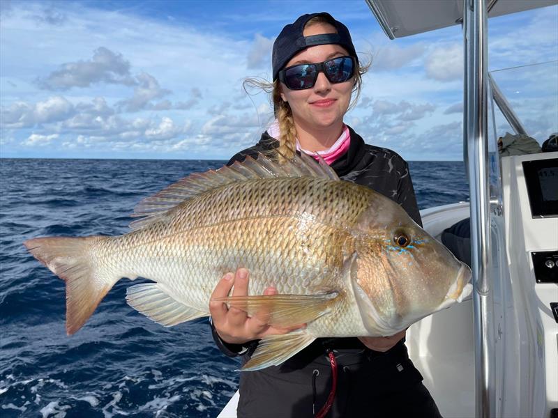 Christie with a chunky grass sweetlip - photo © Fisho's Tackle World