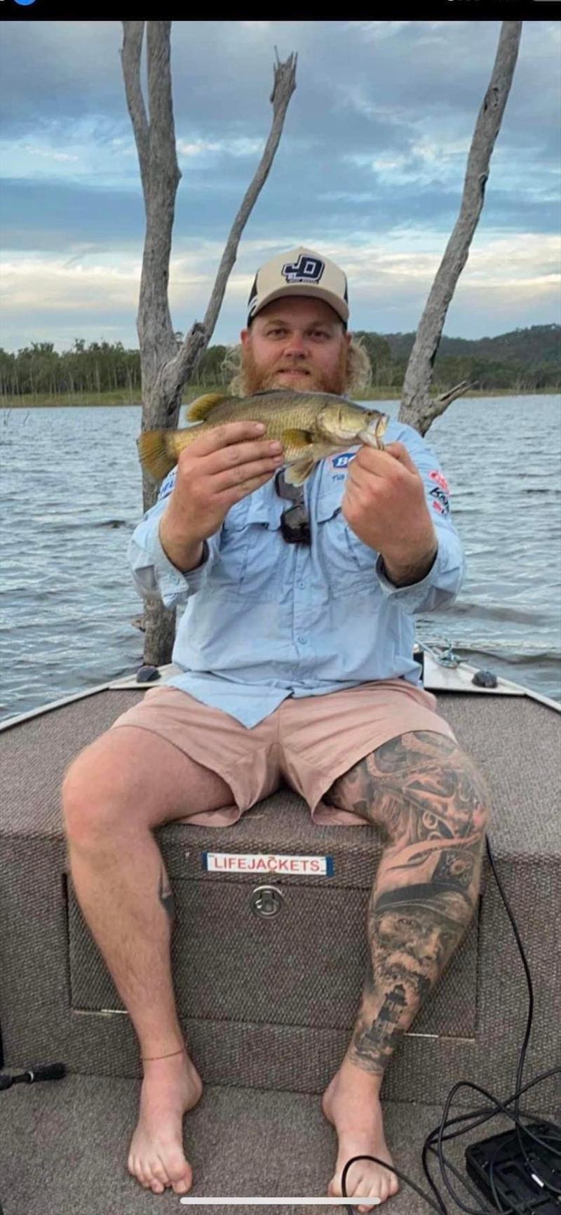 Like a barra, only smaller......Trent's argument is that his large hands make it look small, the barra that is - photo © Fisho's Tackle World