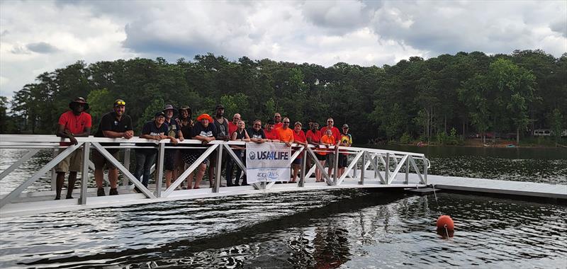 Union Sportsmen's Alliance volunteers from SMART Local 85 and IBEW Local 613 standing on the newly installed AccuDock gangway at Lake Allatoona - photo © Union Sportsmen's Alliance