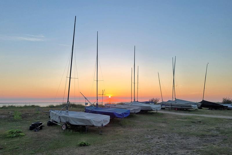 Snettisham Beach SC sunset photo copyright SBSC taken at Snettisham Beach Sailing Club