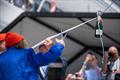 Dr Sylvia Earle cutting the ribbon to christen the boat with a champagne bottle © Marie Lefloch | Team Malizia