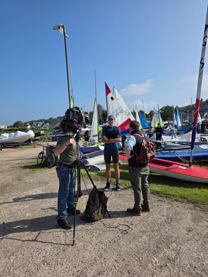 Solway Yacht Club Cadet Week - James Bishop, Senior Instructor, being interviewed by Sandy McCracken of Border Television while cameraman Mike gets it all recorded - photo © Finlay Train
