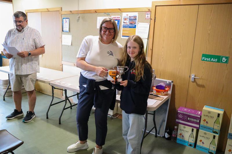 Solway Yacht Club Cadet Week - Cadet Officer Joanne Harris presents Ida Iglehart with her HCP3 trophy after her clean sweep winning every race in her Topper - photo © Nicola McColm