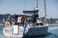 Flair VI committee boat team on Monday at the International Paint Poole Regatta 2026 &copy; Paul Wyeth / www.pwpictures.com