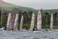 Race start for the Musto Skiff fleet during the Ullswater Daffodil Regatta 2025 © Tim Olin / www.olinphoto.co.uk