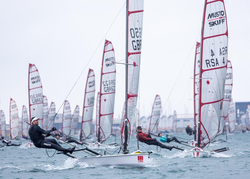 Racing on day 1 of the ACO 13th Musto Skiff 2024 Worlds at the WPNSA photo copyright Michael Oliver taken at Weymouth & Portland Sailing Academy and featuring the Musto Skiff class