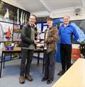 Philip and Emma receiving the Tarn Trophy during the Yeadon National 12 Open © Neil McInnes