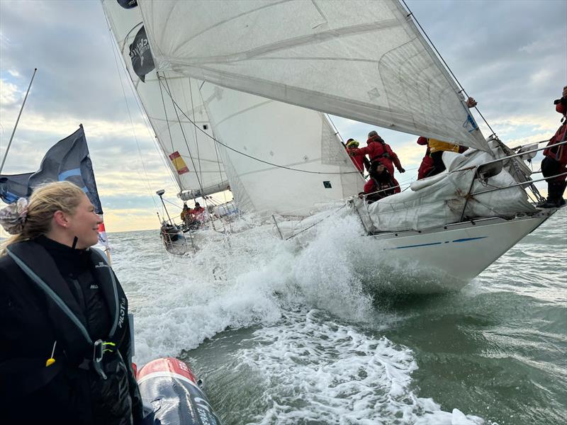 Maiden skipper Heather Thomas boarded the rib to greet Team White Shadow upon their arrival photo copyright Aïda Valceanu / OGR2024 taken at  and featuring the Ocean Globe Race class