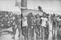 Peter Lester is carried up Takapuna Beach by his fellow sailors after winning the 1977 World OK Championships - February 1977 © NZ Yachting