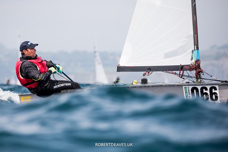 OK Dinghy Worlds Day 3 - Mark Jackson, AUS photo copyright Robert Deaves / www.robertdeaves.uk taken at Lyme Regis Sailing Club and featuring the OK class