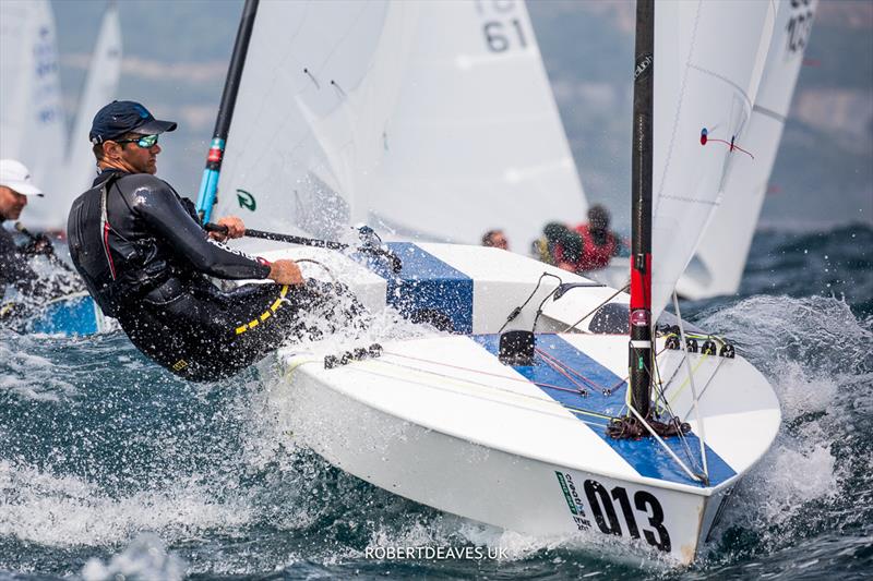 OK Dinghy Worlds Day 3 - Jim Downer, GBR photo copyright Robert Deaves / www.robertdeaves.uk taken at Lyme Regis Sailing Club and featuring the OK class