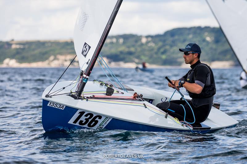 OK Dinghy Worlds Day 4 - Henry Wetherell, GBR photo copyright Robert Deaves / www.robertdeaves.uk taken at Lyme Regis Sailing Club and featuring the OK class