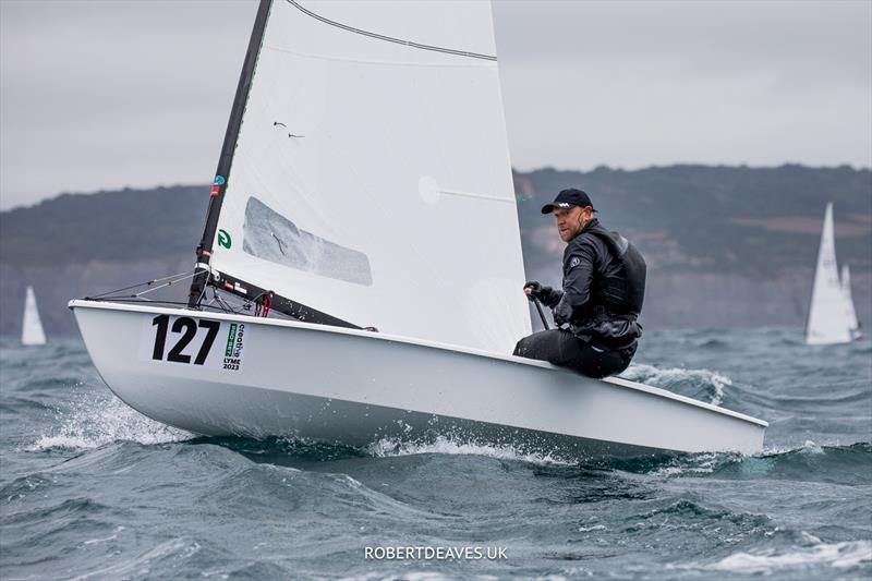 OK Dinghy Worlds Day 5 - Niklas Edler, SWE photo copyright Robert Deaves / www.robertdeaves.uk taken at Lyme Regis Sailing Club and featuring the OK class