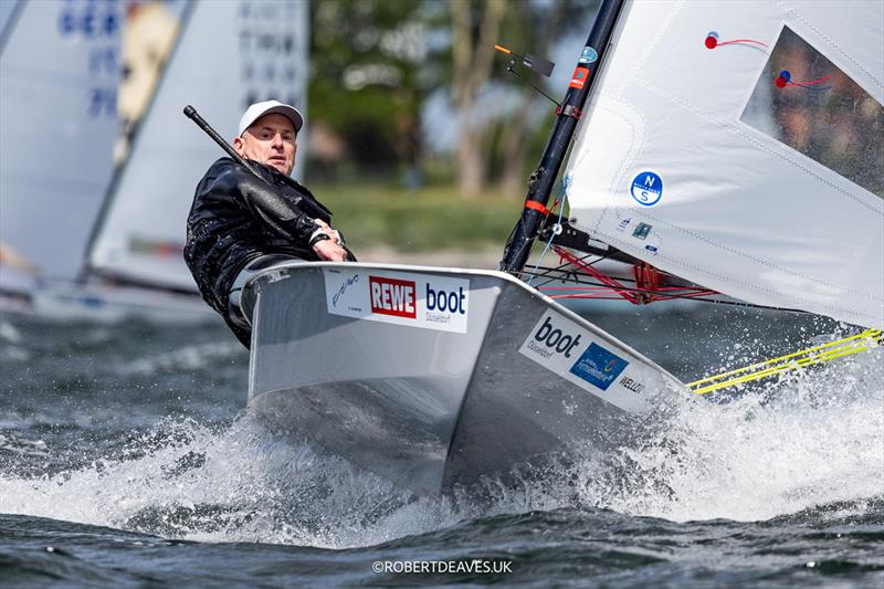 Sebastian Schmidt-Klügmann, GER in the OK Dinghy class at Kieler Woche photo copyright Robert Deaves taken at Kieler Yacht Club and featuring the OK class